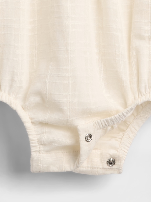 body bébé à col œillet et bulles
