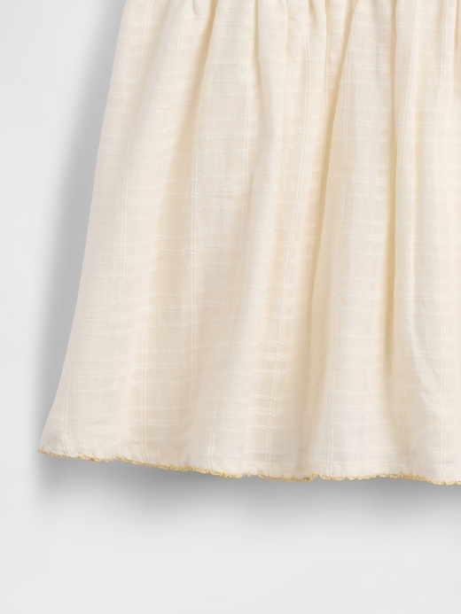 robe bébé brodée à bretelles nouées