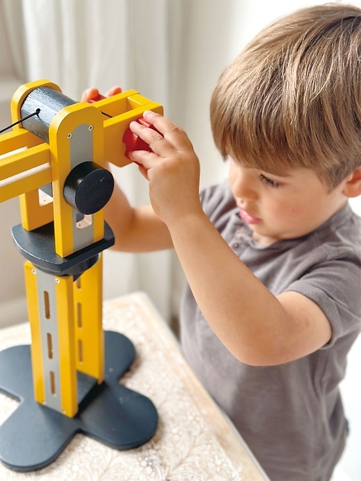 grue jaune pour tout-petits little builder