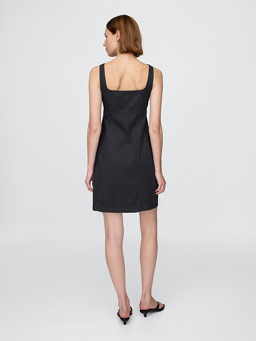 robe boutonnée froncée sur le devant