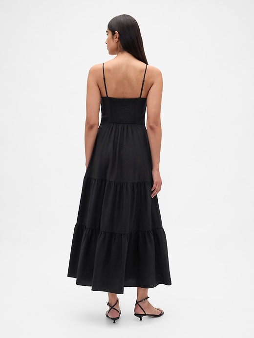 robe longue à volants et nœud sur le devant