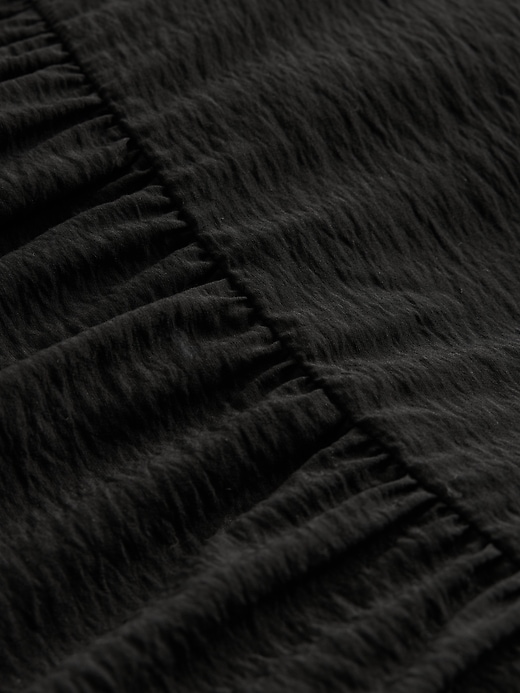 robe longue à volants et nœud sur le devant