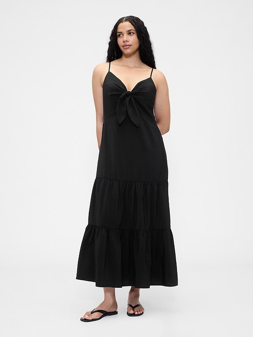 robe longue à volants et nœud sur le devant