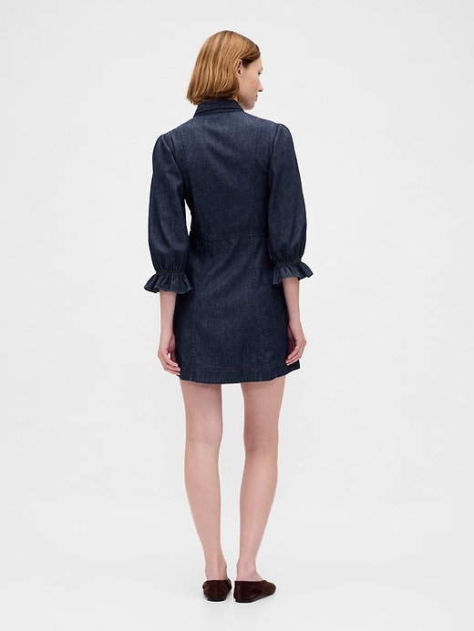 robe courte en jean à manches bouffantes et coutures apparentes