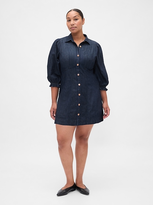 robe courte en jean à manches bouffantes et coutures apparentes