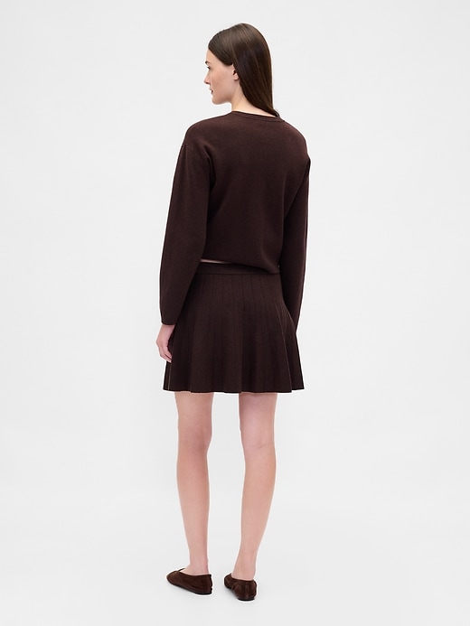 jupe pull mini plissée