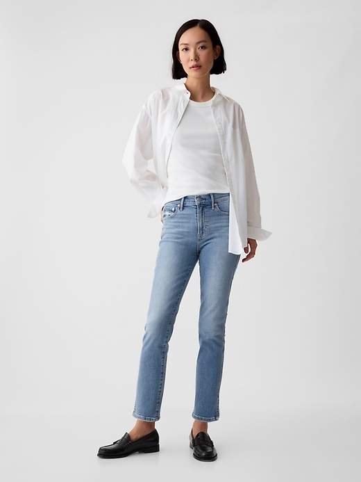 jean slim vintage taille mi-haute à ourlet fendu