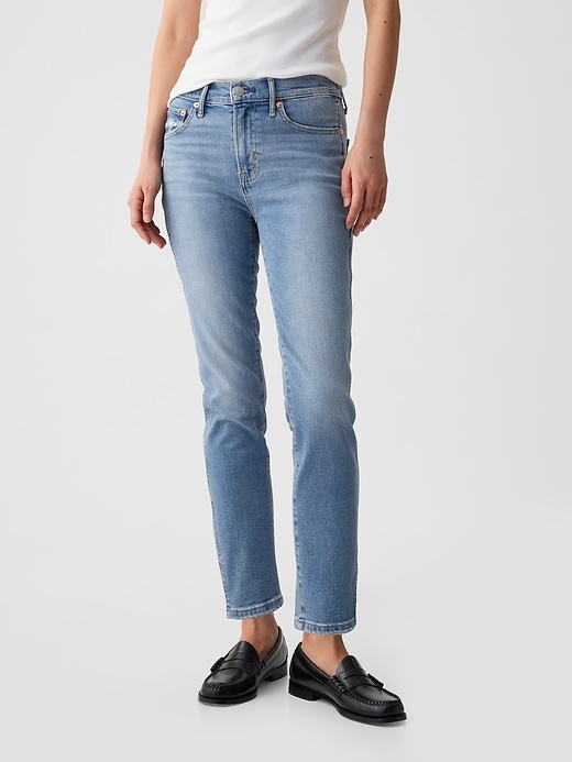 jean slim vintage taille mi-haute à ourlet fendu