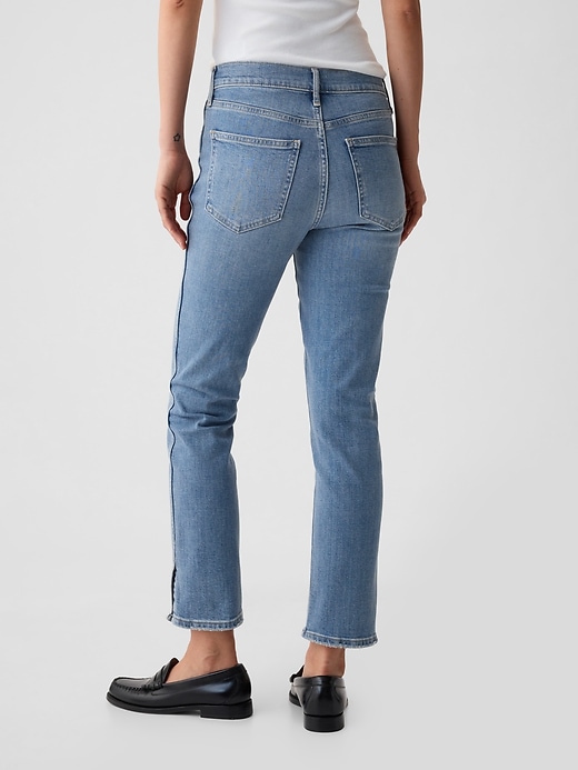 jean slim vintage taille mi-haute à ourlet fendu