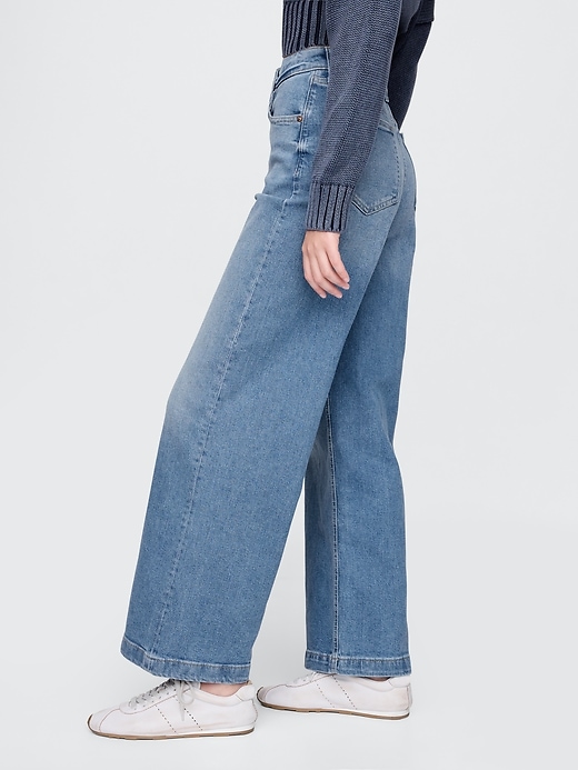 jean large à jambes hautes et chevilles