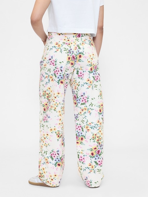 jean à fleurs taille haute