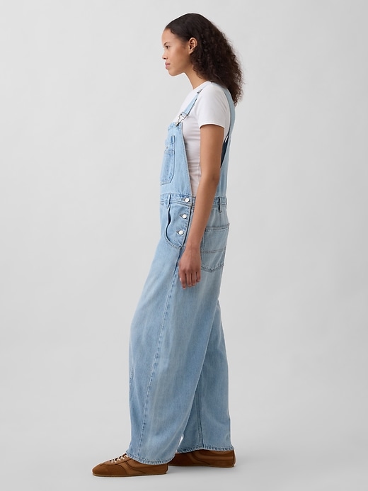 salopette en denim ultra-doux en forme de fer à cheval