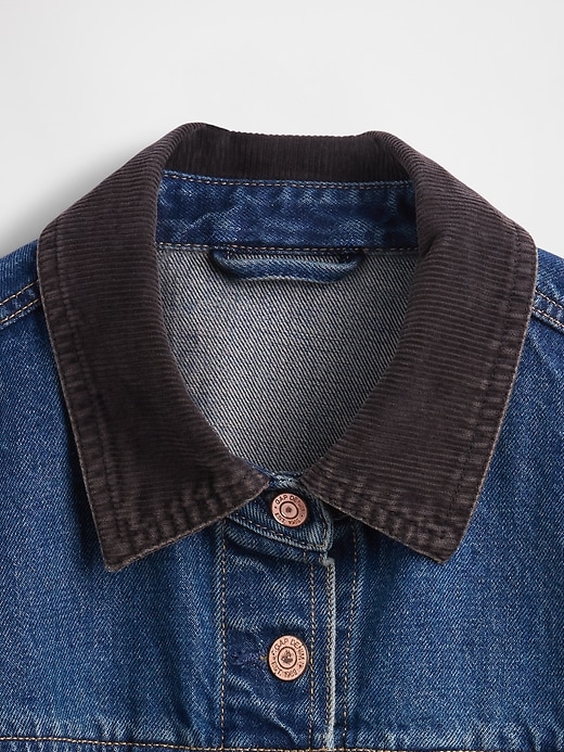 veste en jean longue cintrée