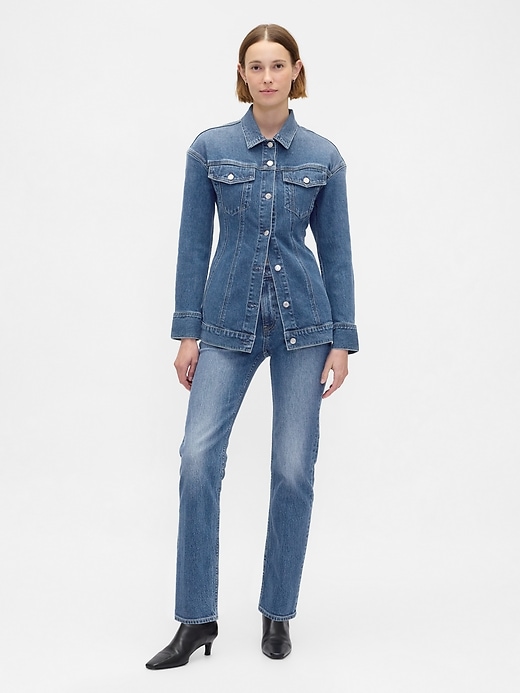 veste en jean longue cintrée