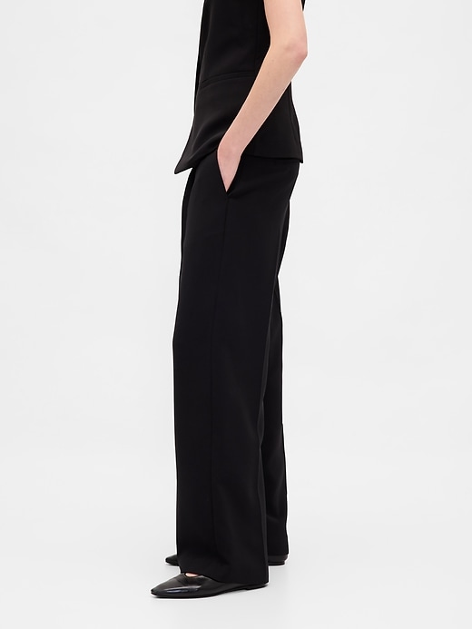 pantalon 365 à jambes larges plissées et taille basse