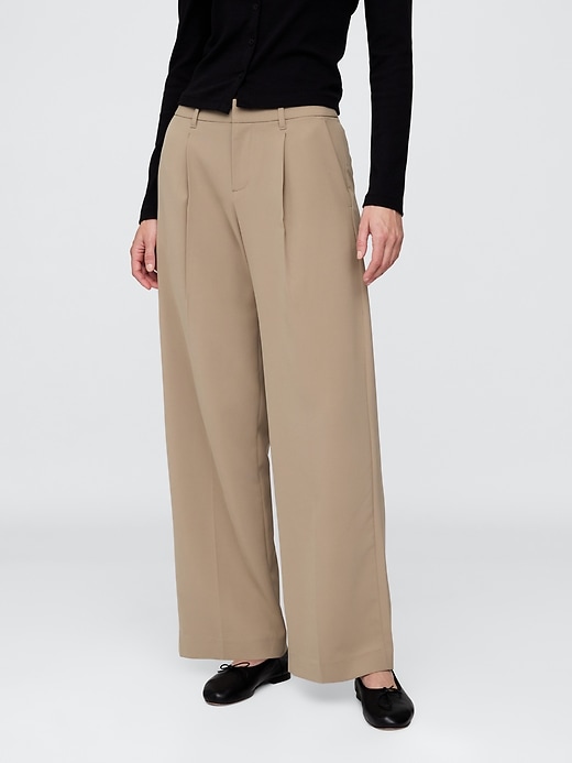 pantalon 365 à jambes larges plissées et taille basse