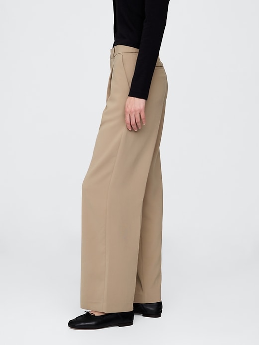 pantalon 365 à jambes larges plissées et taille basse
