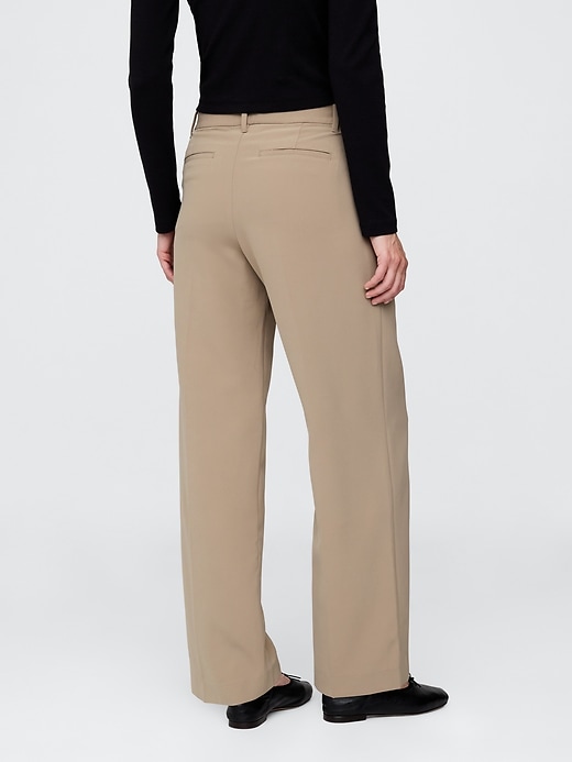 pantalon 365 à jambes larges plissées et taille basse
