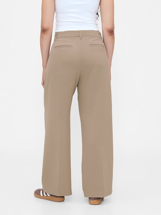 pantalon 365 à jambes larges plissées et taille basse