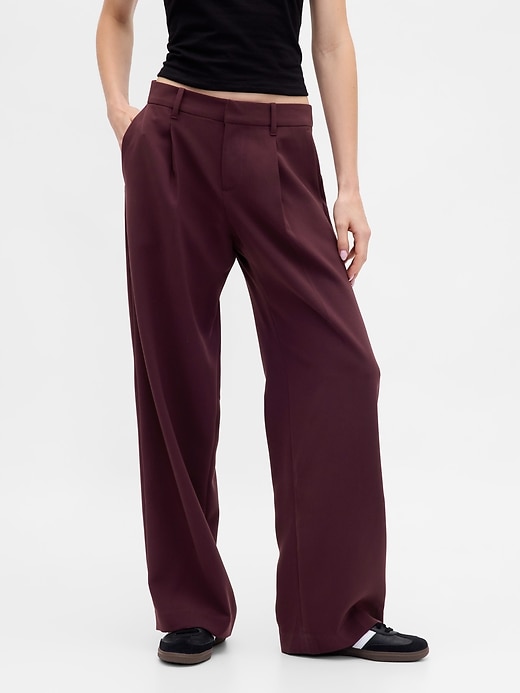 pantalon 365 à jambes larges plissées et taille basse