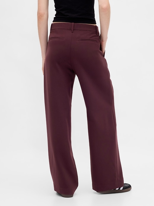 pantalon 365 à jambes larges plissées et taille basse