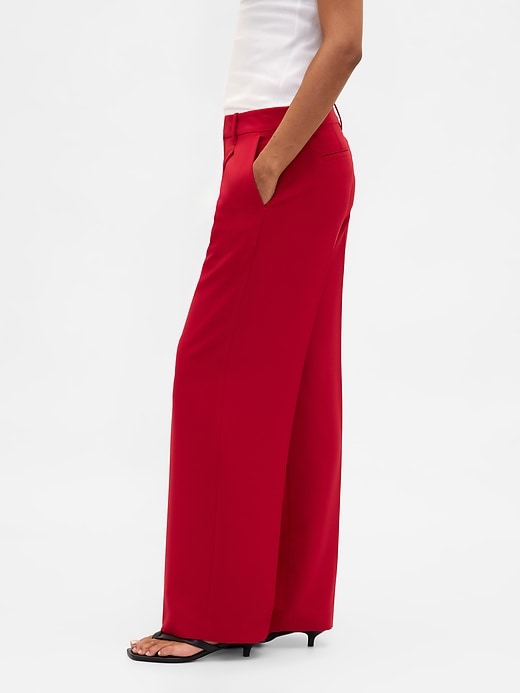 pantalon 365 à jambes larges plissées et taille basse