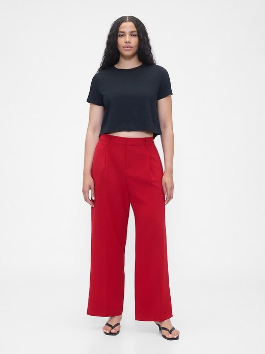 pantalon 365 à jambes larges plissées et taille basse