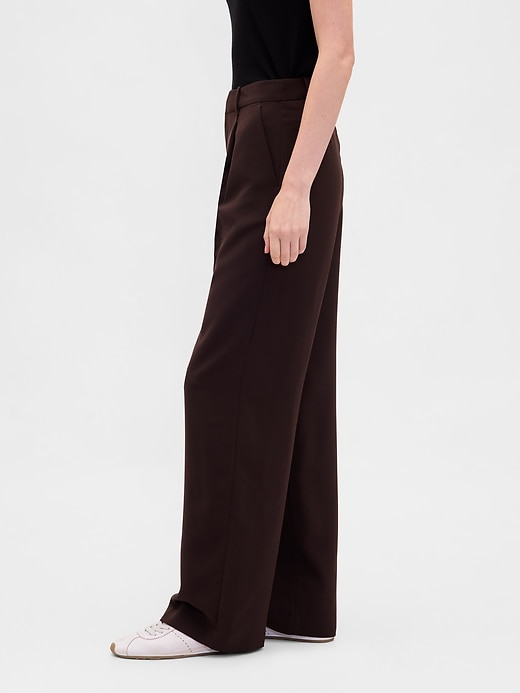 pantalon 365 à jambes larges plissées et taille basse