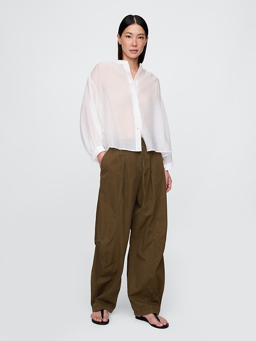 chemise transparente à boutons sur le devant