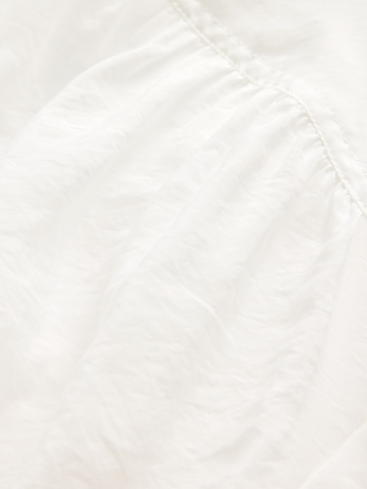chemise transparente à boutons sur le devant