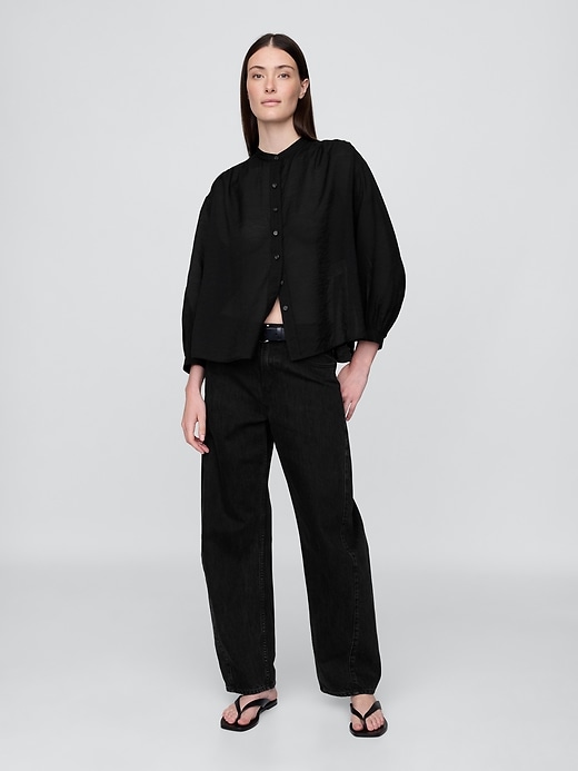 chemise transparente à boutons sur le devant
