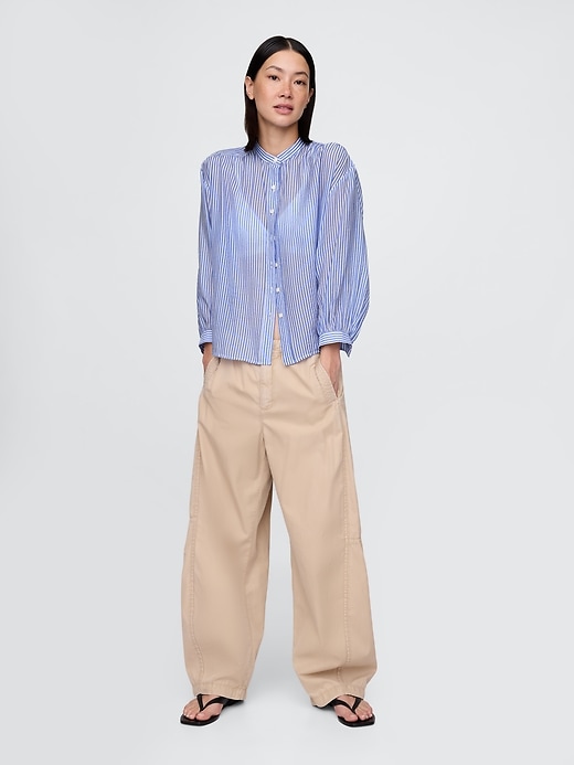 chemise transparente à boutons sur le devant