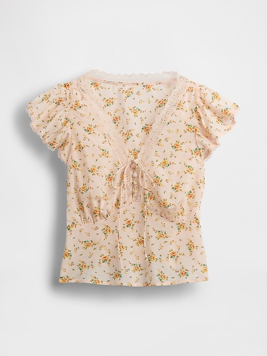 haut fleuri à bordure en dentelle
