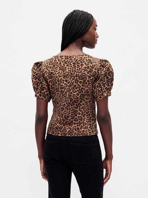 haut à manches bouffantes et coutures apparentes