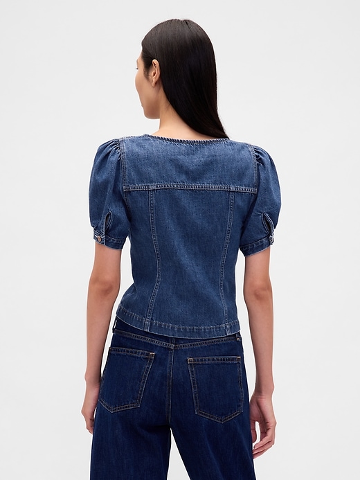 haut en denim à manches bouffantes et coutures apparentes