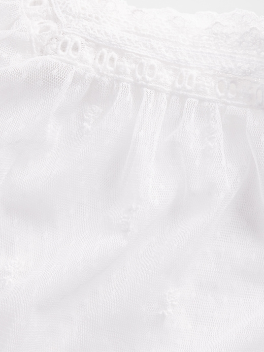 haut en tulle transparent brodé