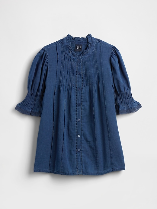 chemise à volants et plis piqués