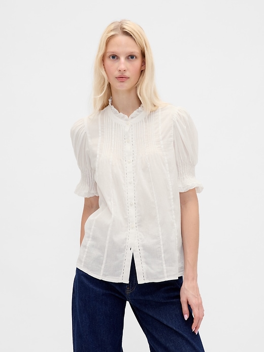 chemise à volants et plis piqués