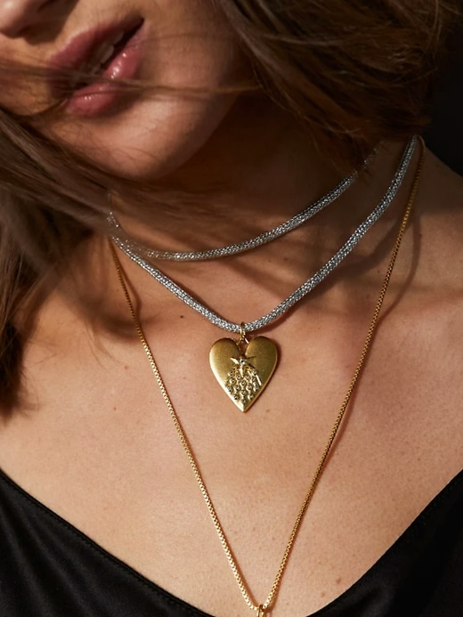 cordon hart en lurex argenté avec breloque cœur de halley