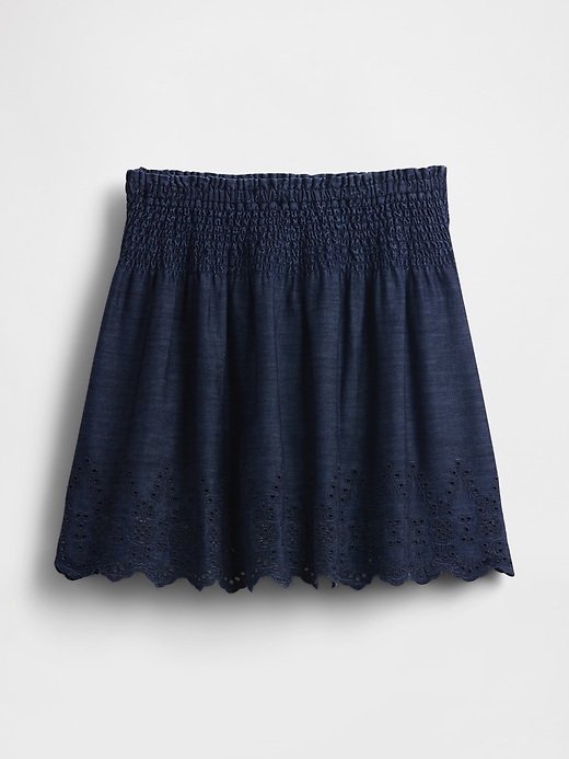 mini-jupe en jean à œillets