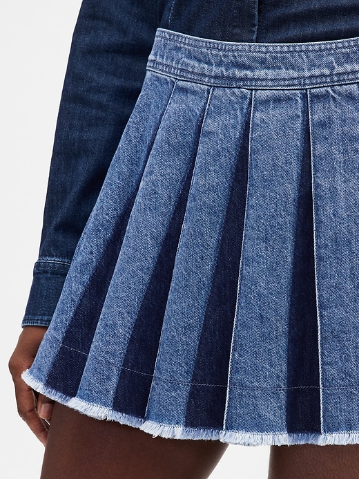 mini-jupe plissée en jean