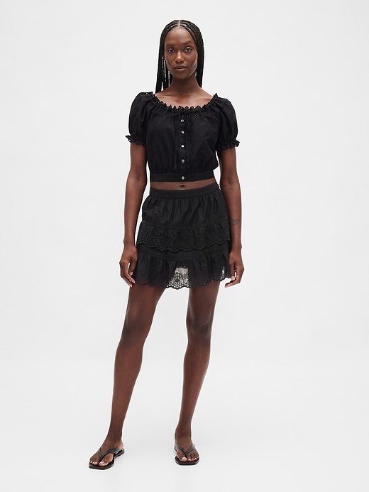 jupe-short mini à œillets et volants