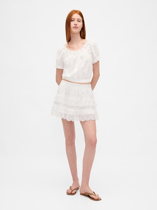 jupe-short mini à œillets et volants