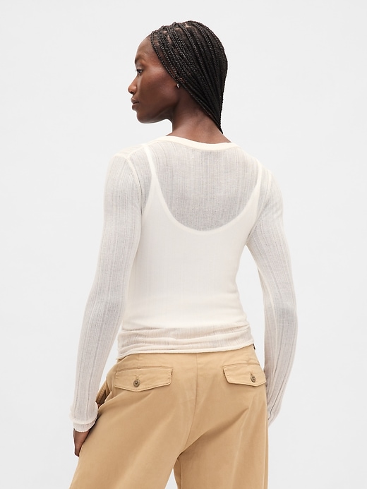 pull henley côtelé transparent