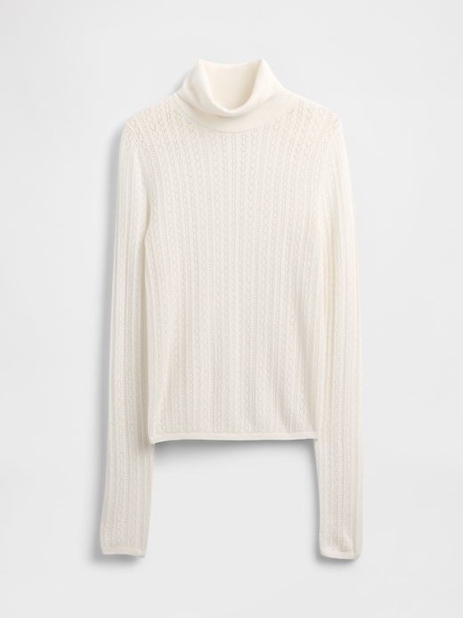 pull à col roulé en maille ajourée
