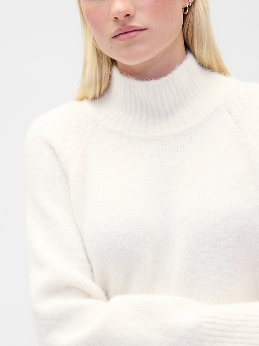 pull à col roulé oversize duveteux