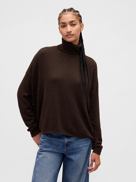 col roulé oversize en maille ajourée