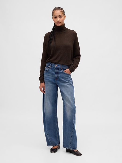 col roulé oversize en maille ajourée
