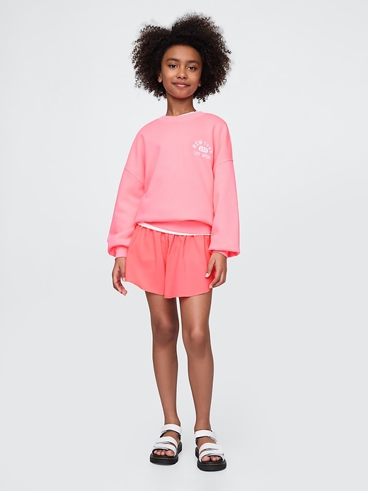 short de course à séchage rapide pour enfants avec ourlet papillon