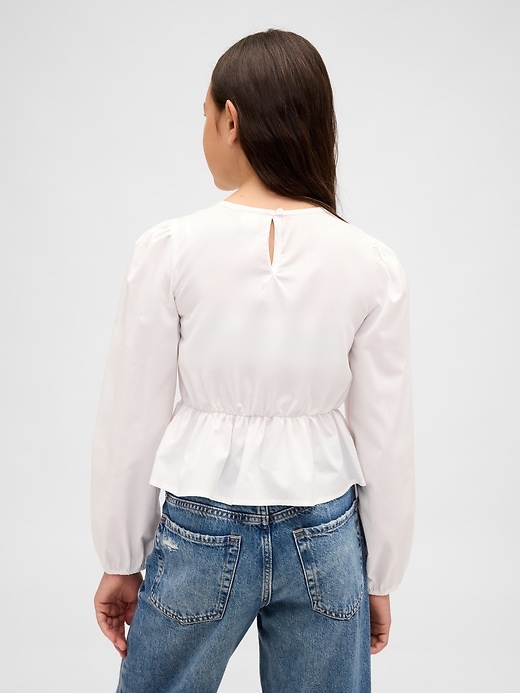 haut péplum smocké pour enfant